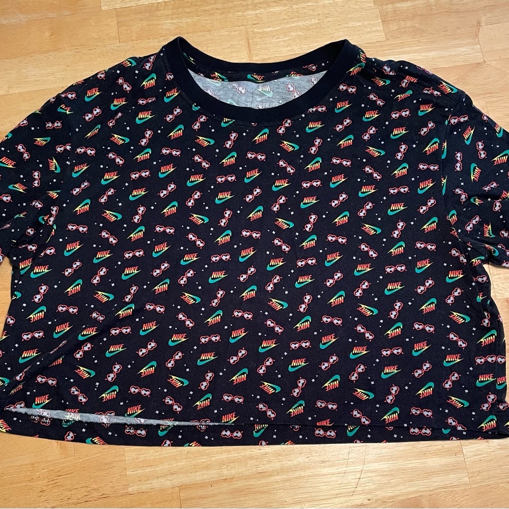 Womens Black Nike tshirt w/ Nike swoosh all over Size Medium